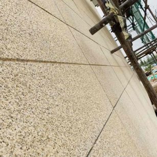 东营 黄金麻花岗岩荔枝面外墙干挂石材效果示例