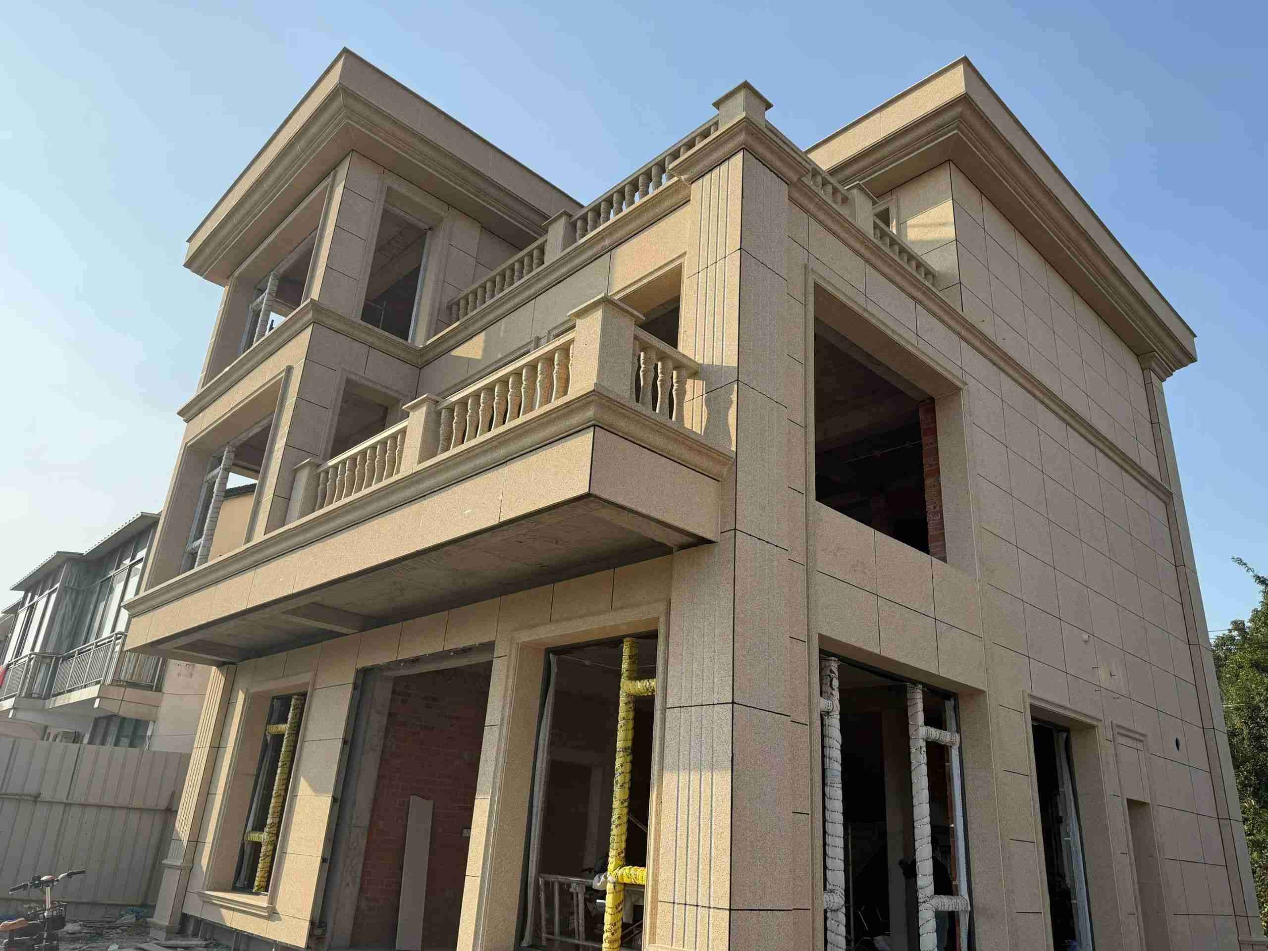 东营 黄金麻花岗岩石材荔枝面外墙干挂效果展示